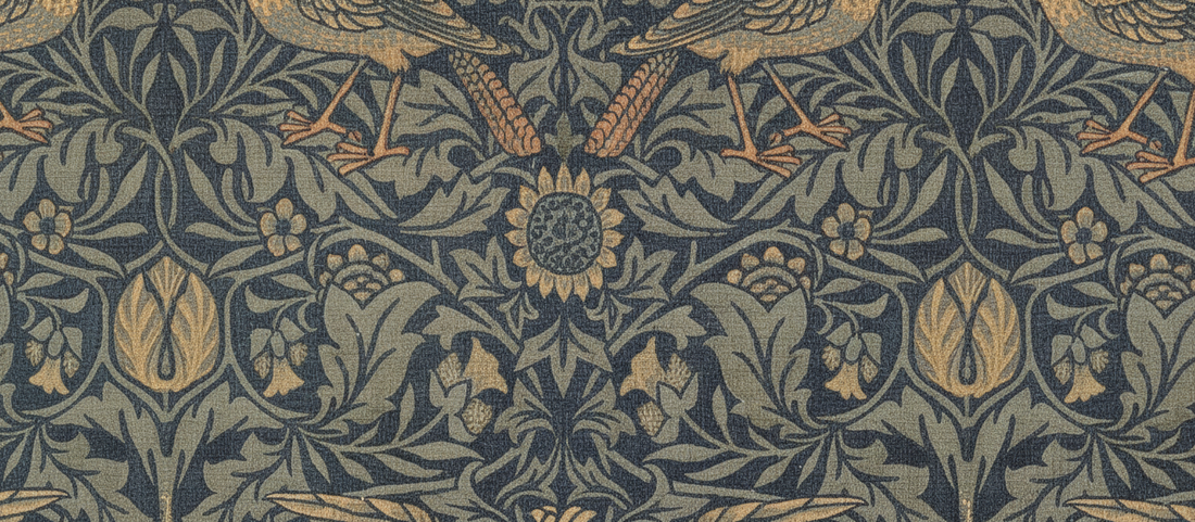 William Morris Bird Fabric 1877-1878 showing thrushes perched among dense scrolling foliage in indigo discharge print