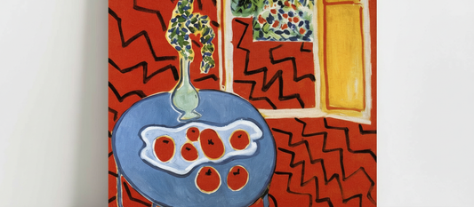 Red Interior, Still Life on Blue Table (1947) by Henri Matisse, featuring bold red walls and a vibrant blue table with abstract still life objects