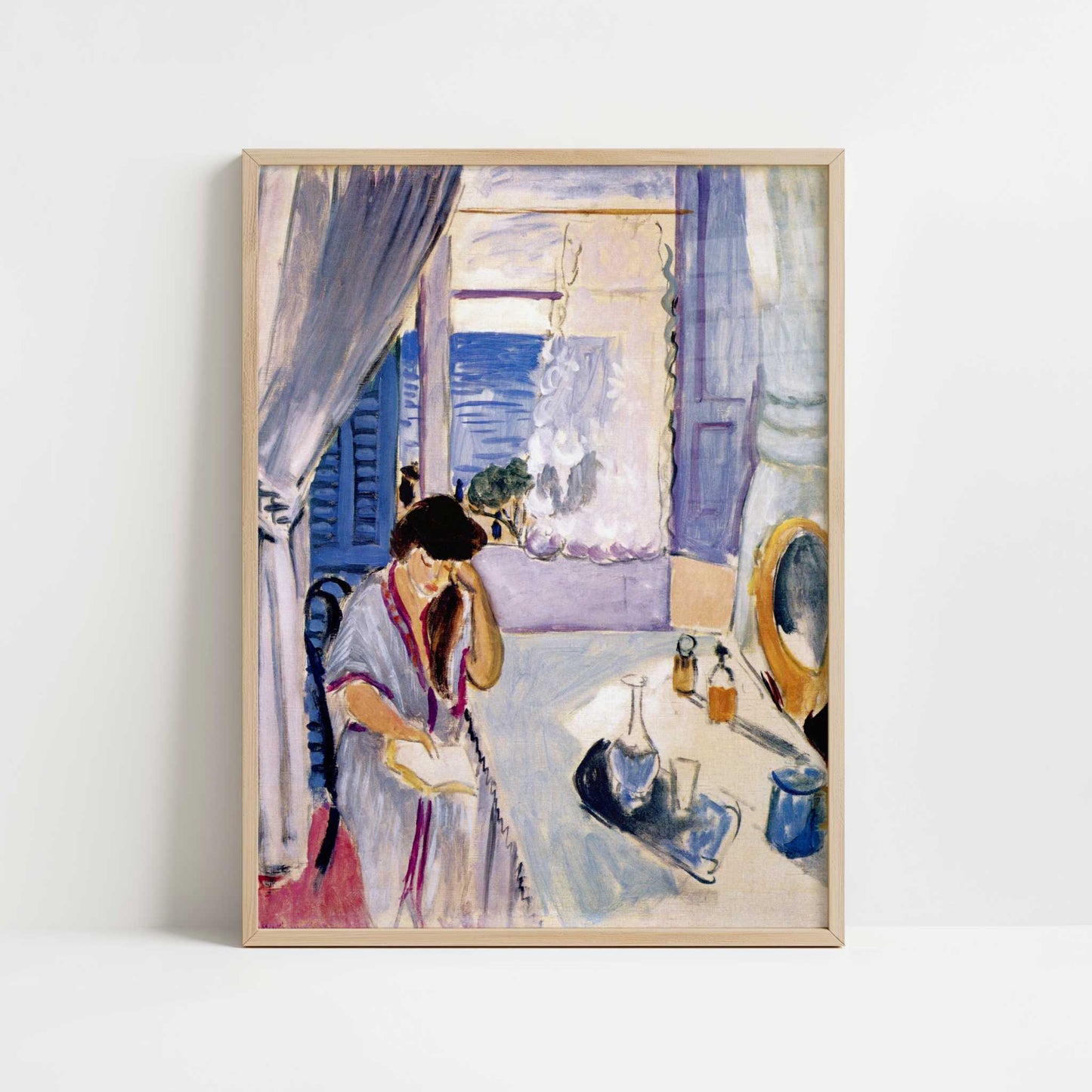 Woman Reading at a Dressing Table (1919) by Henri Matisse – Art Print - Art print in oak frame