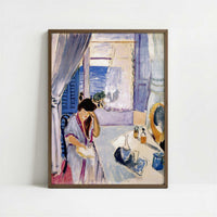 Woman Reading at a Dressing Table (1919) by Henri Matisse – Art Print - Art print in dark wood frame