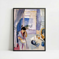 Woman Reading at a Dressing Table (1919) by Henri Matisse – Art Print - Art print in black frame