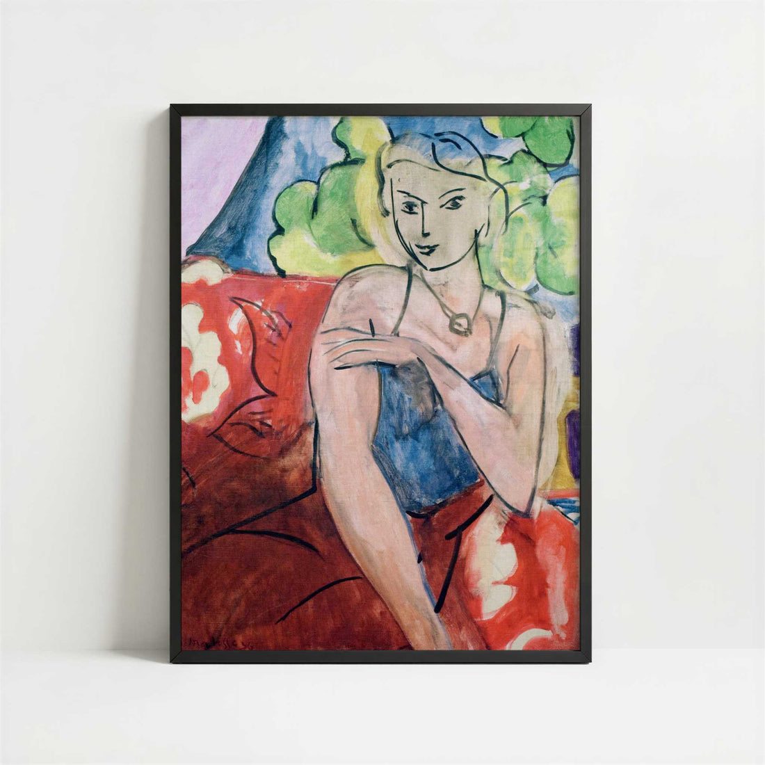 Young Girl Seated (1936) by Henri Matisse – Art Print - Art print in black frame