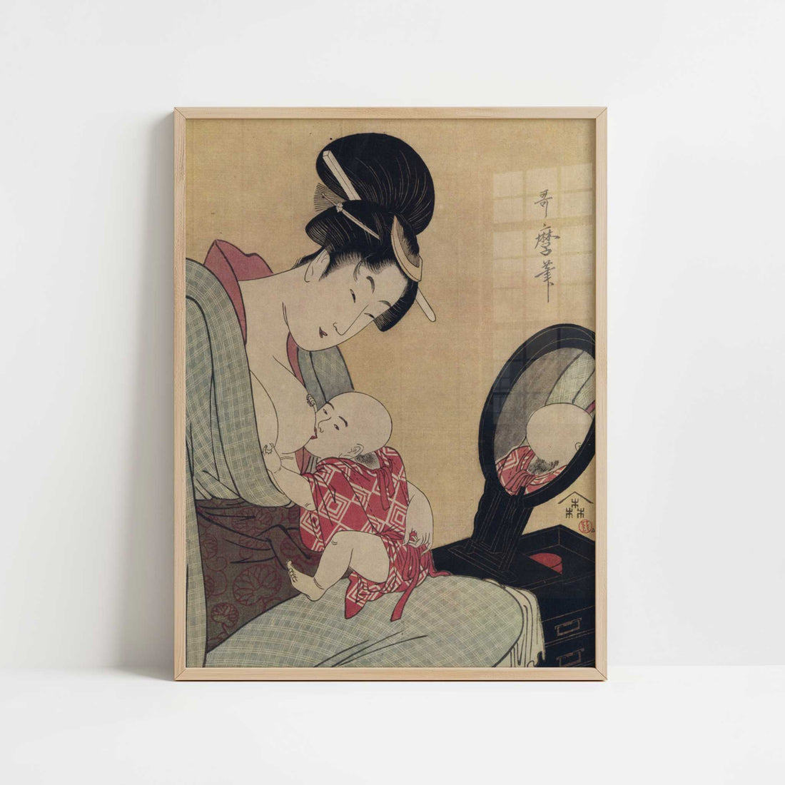 Young Mother Feeding Her Child (1790s) by Utamaro – Art Print - Art print in oak frame