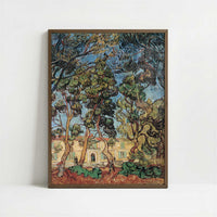 Trees in Front of the Asylum (1889) by Vincent van Gogh – Art Print - Art print in dark wood frame