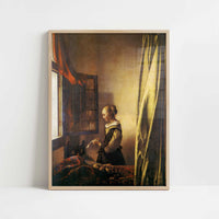 A Girl Reading a Letter (1657) by Johannes Vermeer – Art Print - Art print in oak frame