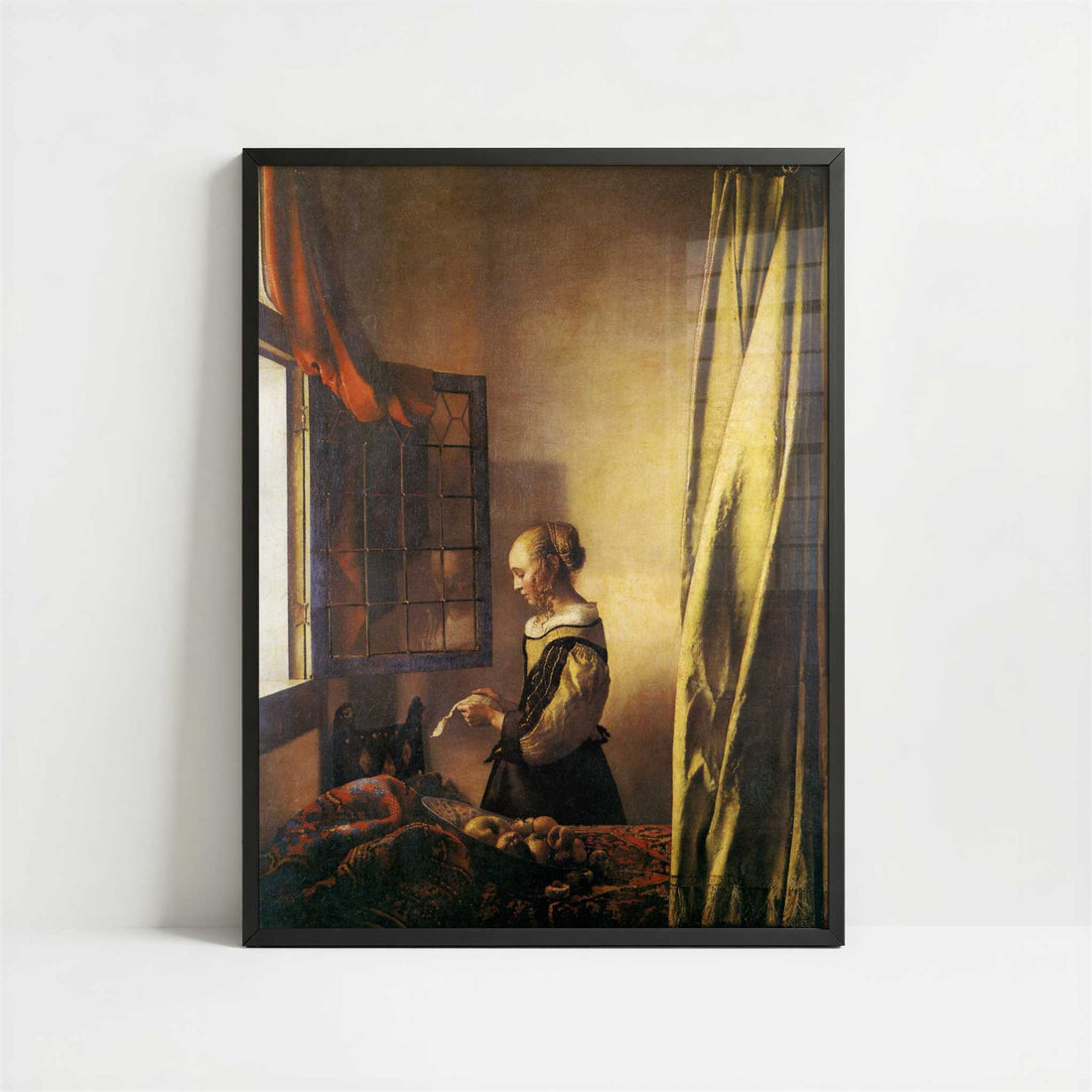 A Girl Reading a Letter (1657) by Johannes Vermeer – Art Print - Art print in black frame