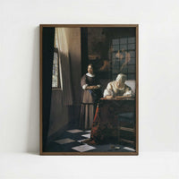 Lady Writing a Letter with Her Maid (c.1670) by Johannes Vermeer – Art Print - Art print in dark wood frame